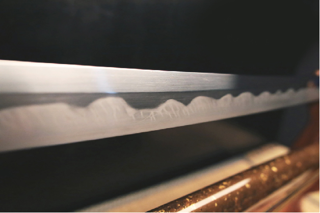 a close up of a sword